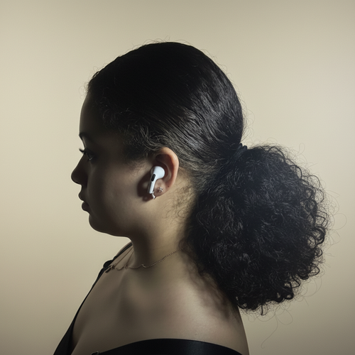 Model wearing earbuds - original